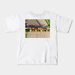 Aerial view of country road, autumn trees and ploughed field Kids T-Shirt